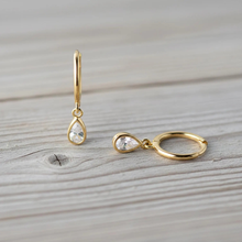 Load image into Gallery viewer, Sterling silver teardrop huggie earrings with dainty cubic zirconia accents, stylish hoop jewelry from Luxe Treasures.