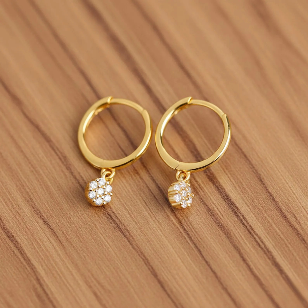 Gold diamond huggie hoop earrings for women featuring minimalist design and dainty drop dangle style, perfect for bridal jewelry.