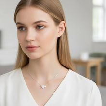 Load image into Gallery viewer, Sterling silver heart pendant necklace with zirconia on a delicate clavicle chain, designed by Luxe Treasures.