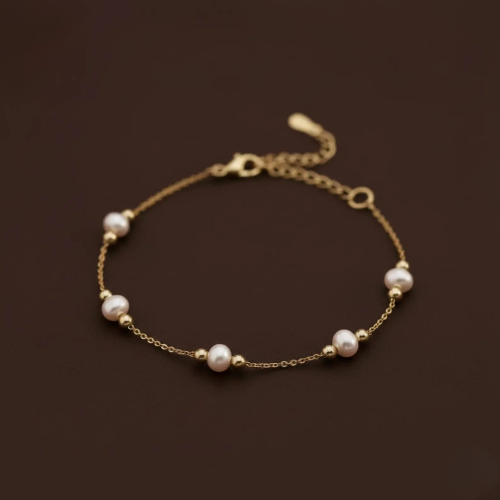 Luxe Treasures 18K gold plated freshwater pearl bracelet featuring delicate, minimalist design for wedding jewelry.
