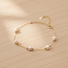 Load image into Gallery viewer, 18K gold plated freshwater pearl bracelet by Luxe Treasures, dainty minimalist wedding jewelry with elegant pearl accents.