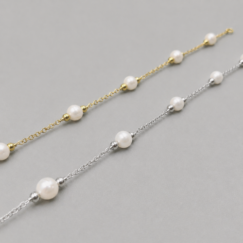 Dainty 18K gold plated freshwater pearl bracelet from Luxe Treasures, minimalist wedding jewelry with a delicate design.