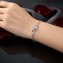 Load image into Gallery viewer, Sterling silver heart bracelet by Luxe Treasures, adjustable minimalist jewelry with delicate heart charm and sleek design.