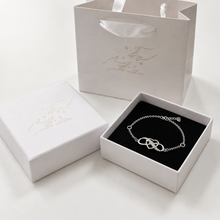 Load image into Gallery viewer, Sterling silver heart bracelet by Luxe Treasures, adjustable minimalist jewelry with a delicate heart charm on a sleek chain.