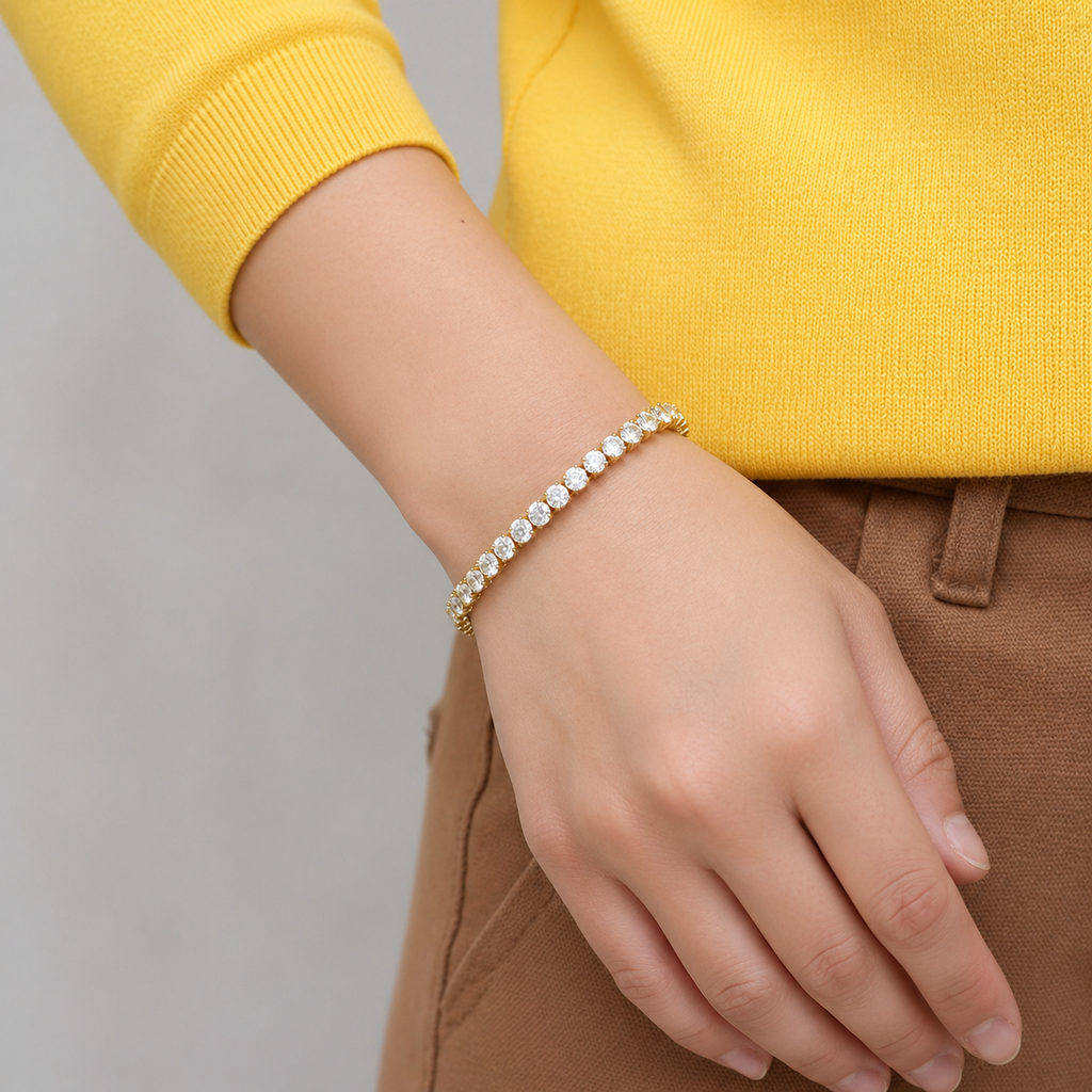 Gold tennis bracelet with sparkling zirconia stones, luxury jewelry piece, featuring intricate design and elegant craftsmanship.