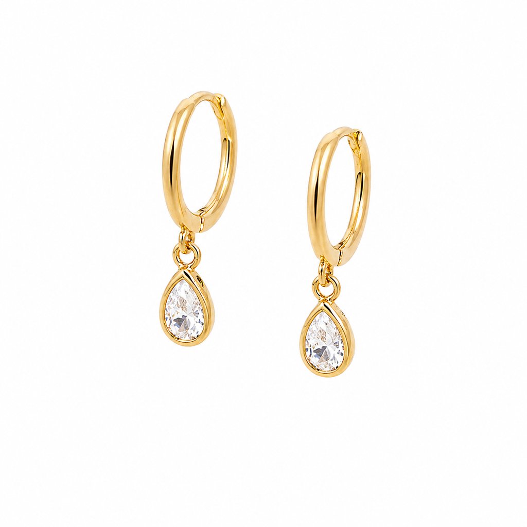 Sterling silver teardrop huggie earrings with dainty cubic zirconia accents, designed by Luxe Treasures.