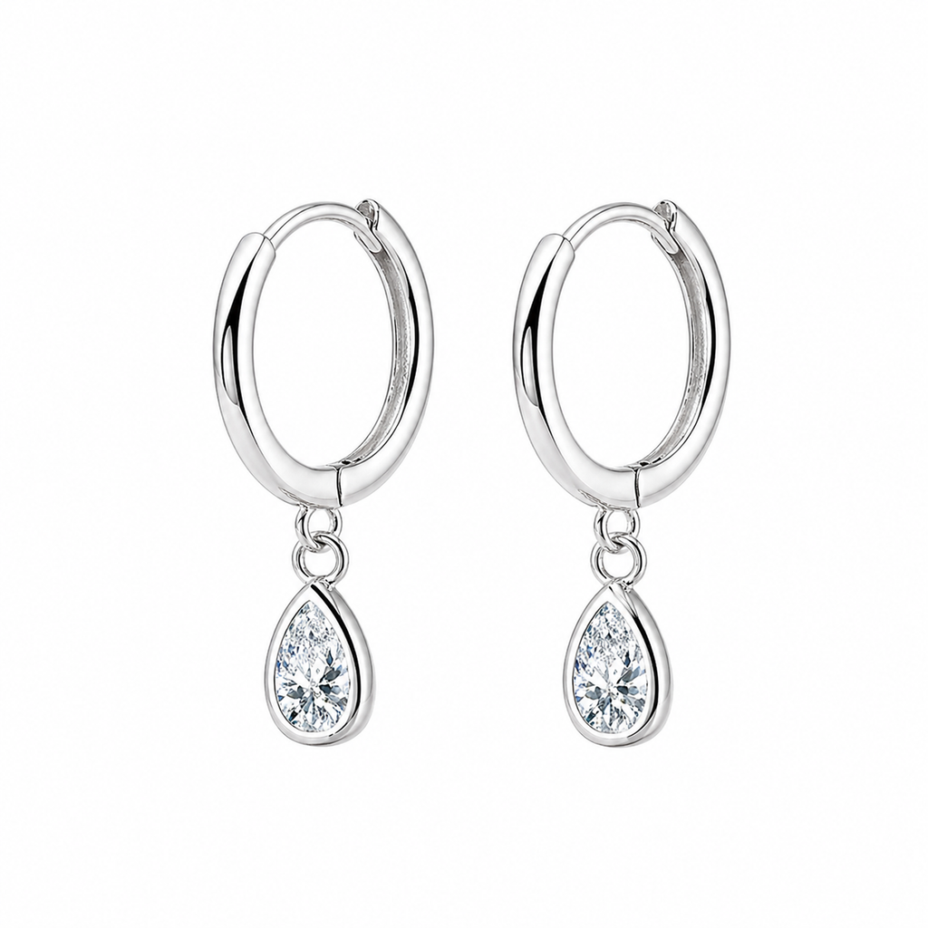 Sterling silver teardrop huggie earrings with dainty CZ stones, stylish hoop design by Luxe Treasures.