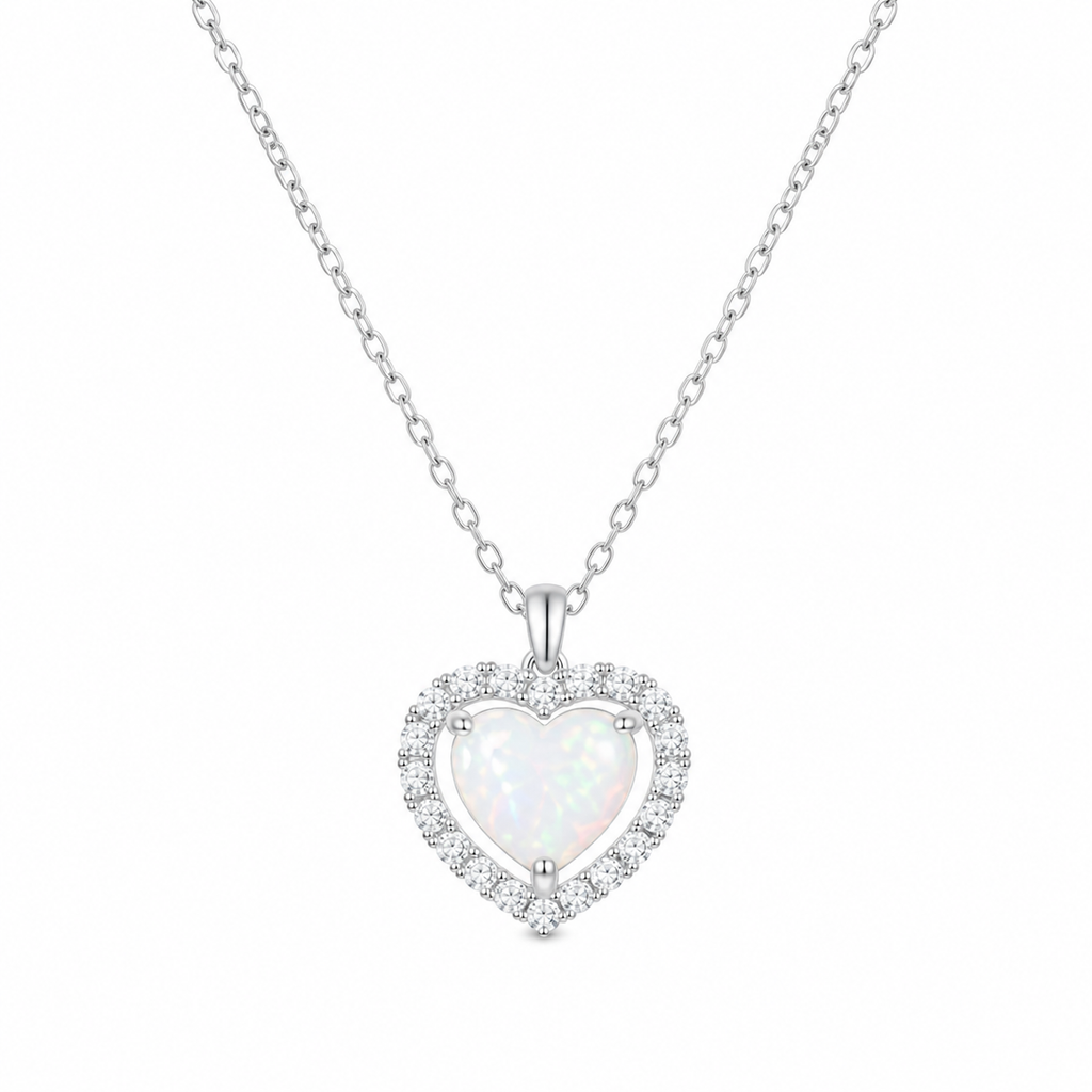 Sterling silver opal heart necklace with diamond pendant from Luxe Treasures, featuring a sparkling gemstone design.