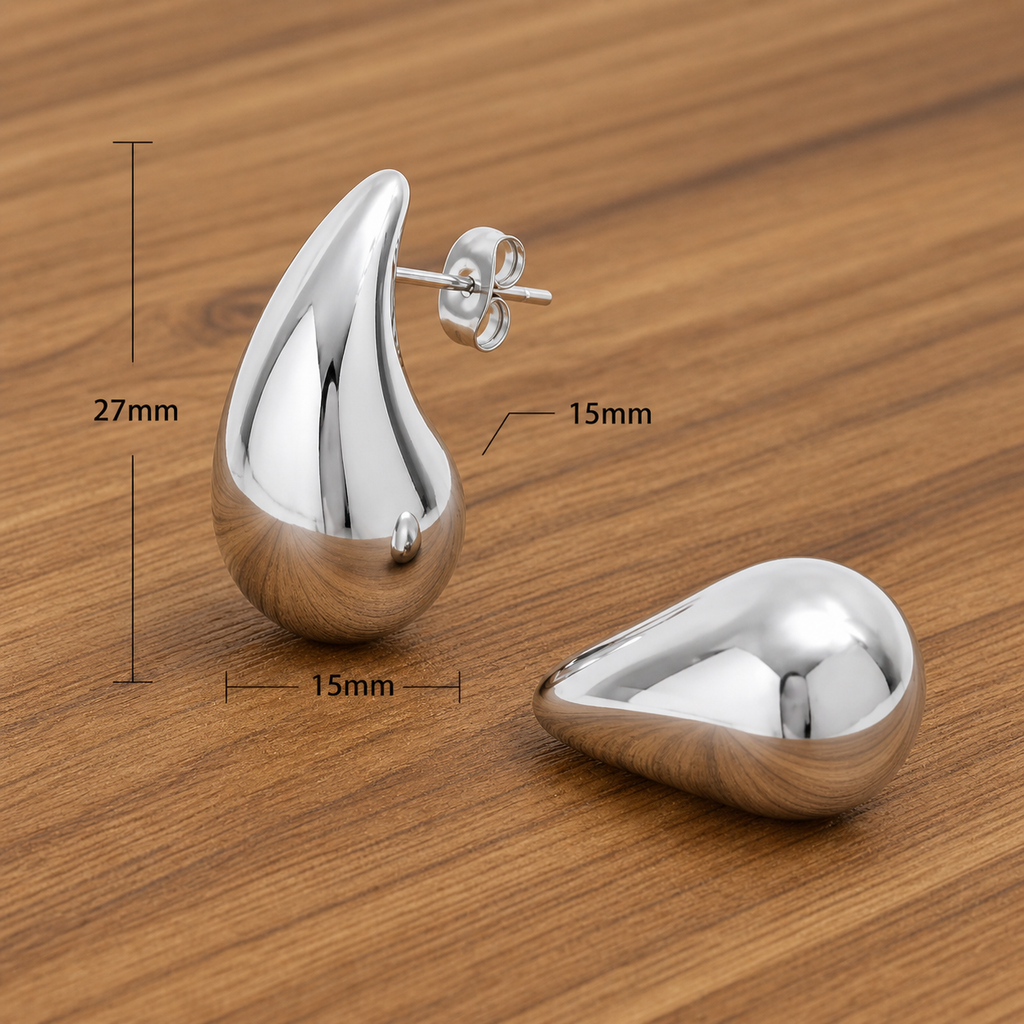 Gold teardrop stud earrings by Luxe Treasures, minimalist high-polish statement jewelry featuring chunky design and elegant style.