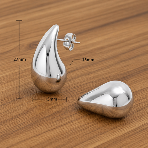 Gold teardrop stud earrings by Luxe Treasures, minimalist high-polish statement jewelry featuring chunky design and elegant style.