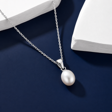 Load image into Gallery viewer, Gold teardrop pearl necklace with a freshwater pearl pendant, featuring elegant jewelry craftsmanship by Luxe Treasures.