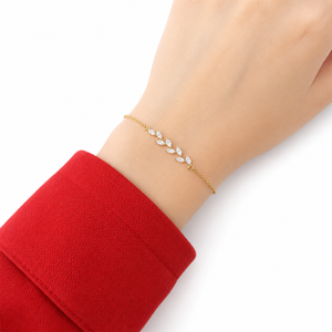 Dainty Leaf Marquise CZ bracelet by Luxe Treasures, minimalist bridal jewelry featuring leaf-shaped marquise CZ stones on a delicate chain.