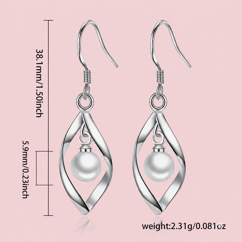 Sterling silver freshwater pearl dangle earrings with boho rhombus drop design, featuring elegant, natural pearl accents.