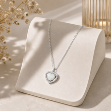 Load image into Gallery viewer, Sterling silver opal heart necklace with diamond pendant from Luxe Treasures, featuring a sparkling gemstone and elegant chain.
