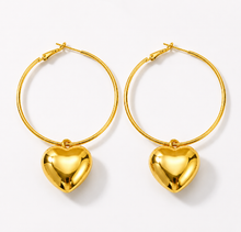 Load image into Gallery viewer, Luxury Luxe Treasures heart drop hoop earrings in a gift box, fashionable jewelry for women featuring elegant heart-shaped design.