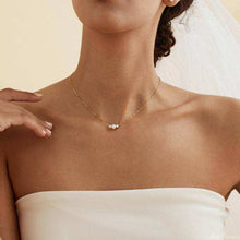 Load image into Gallery viewer, Dainty gold necklace with three freshwater pearls, minimalist layering jewelry by Luxe Treasures, close-up of the delicate necklace.