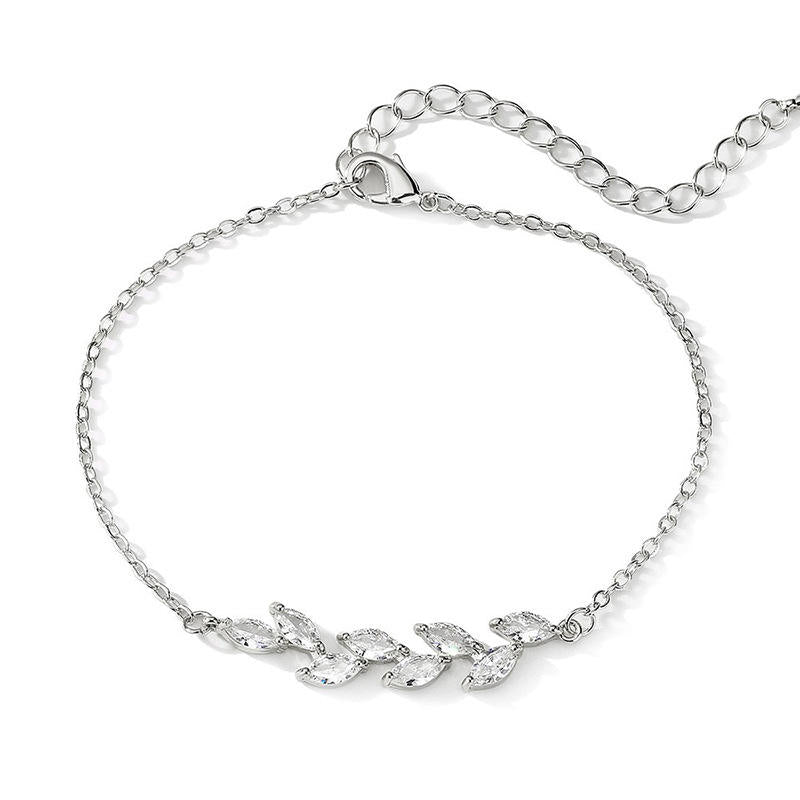 Dainty Leaf Marquise CZ bracelet by Luxe Treasures featuring minimalist bridal jewelry with leaf-shaped and marquise-cut cubic zirconia.