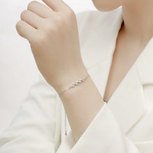 Load image into Gallery viewer, Dainty Leaf Marquise CZ bracelet by Luxe Treasures featuring delicate leaf and marquise-shaped cubic zirconia accents.
