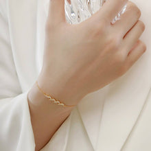 Load image into Gallery viewer, Dainty Leaf Marquise CZ bracelet by Luxe Treasures featuring minimalist bridal jewelry with sparkling cubic zirconia accents.