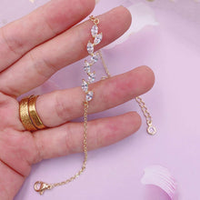 Load image into Gallery viewer, Dainty Leaf Marquise CZ bracelet by Luxe Treasures, minimalist bridal jewelry with leaf-shaped marquise stones on a delicate chain.