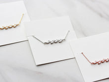 Load image into Gallery viewer, Dainty Leaf Marquise CZ bracelet by Luxe Treasures, minimalist bridal jewelry with delicate leaf-shaped CZ accents on a fine chain.
