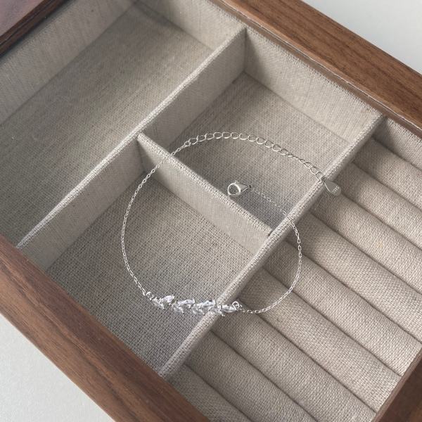 Dainty Luxe Treasures Leaf Marquise CZ bracelet with minimalist design, perfect for bridal jewelry and elegant occasions