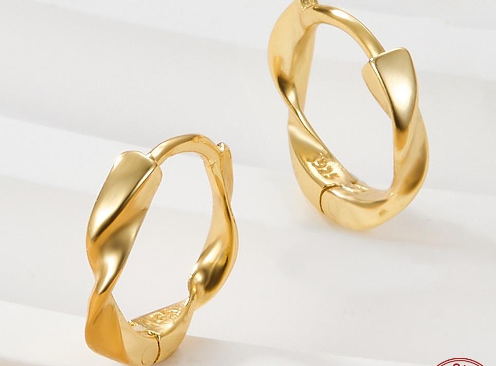 Sterling silver twisted huggie hoop earrings with gold plating, dainty and stylish jewelry by Luxe Treasures