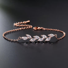 Load image into Gallery viewer, Dainty Leaf Marquise CZ bracelet from Luxe Treasures, minimalist bridal jewelry with delicate leaf-shaped CZ accents.