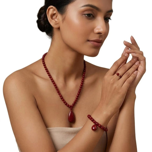 Red beaded jewelry set with necklace bracelet and ring
