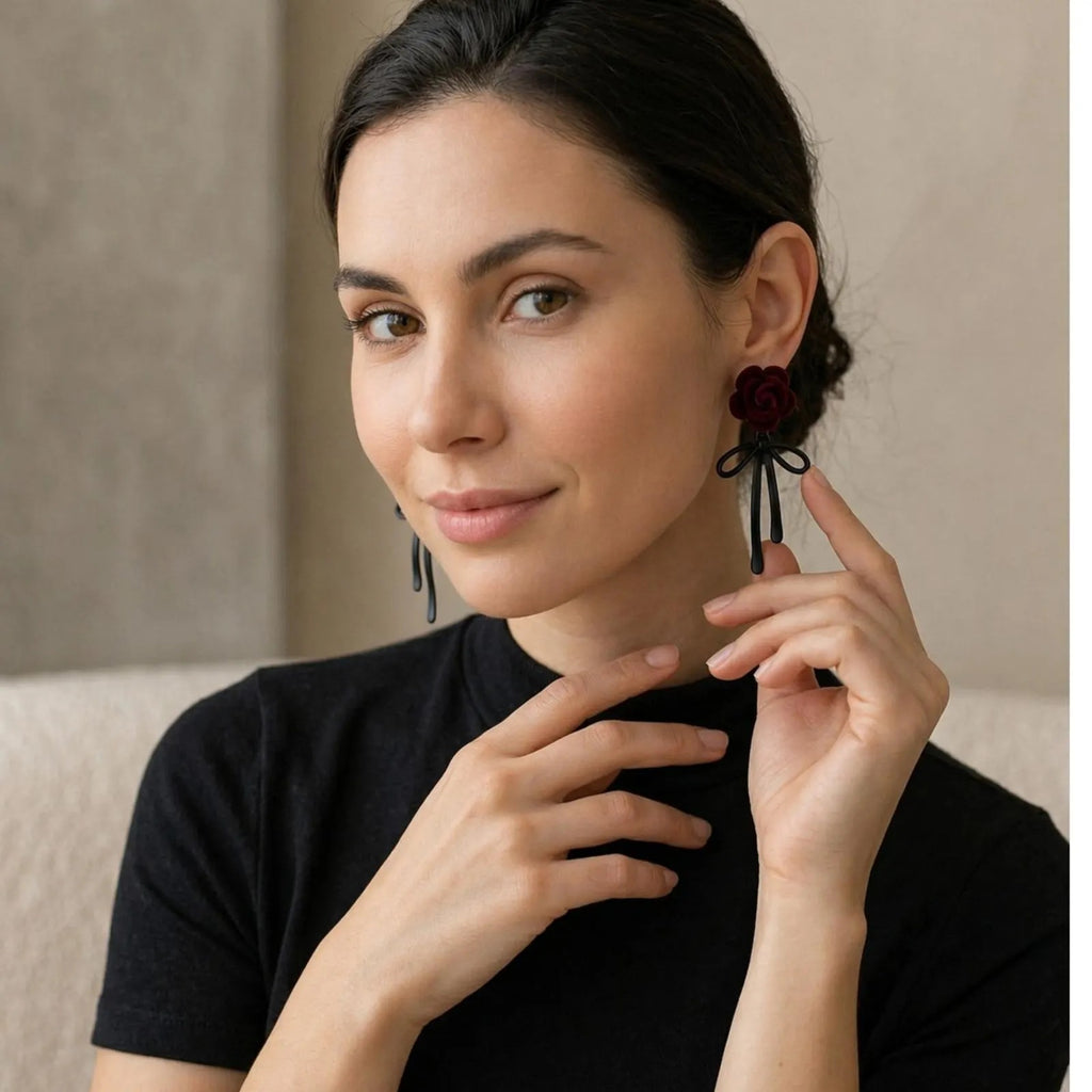 Romantic red rose earrings with black ribbon and floral dangle design, elegant jewelry for women by Luxe Treasures.
