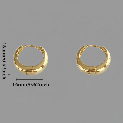 Gold hoop earrings from Luxe Treasures, minimalist vintage jewelry, round hoops with a sleek gold finish for everyday wear.