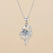 Load image into Gallery viewer, Sterling silver moissanite necklace with 0.5 carat dainty pendant, elegant jewelry piece from Luxe Treasures.