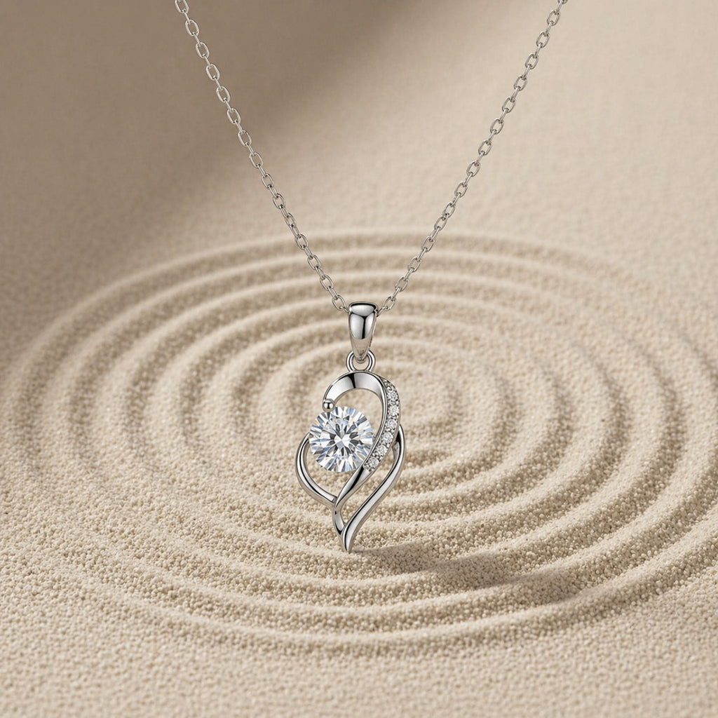 Dainty sterling silver moissanite necklace with 0.5 carat pendant, elegant jewelry piece by Luxe Treasures.