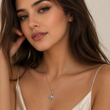 Load image into Gallery viewer, Sterling silver dainty moissanite necklace with 0.5 carat pendant, elegant jewelry by Luxe Treasures.