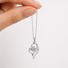 Load image into Gallery viewer, Sterling silver moissanite necklace with a dainty 0.5 carat pendant, elegant jewelry piece from Luxe Treasures.