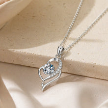 Load image into Gallery viewer, Sterling silver moissanite necklace with a 0.5 carat pendant, dainty jewelry from Luxe Treasures, displayed on a white background.