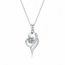 Load image into Gallery viewer, Sterling silver moissanite necklace with a dainty 0.5 carat pendant, featuring sparkling gemstone on a delicate chain.