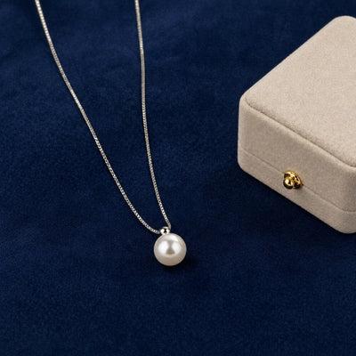 Sterling silver necklace with a fresh water shell pearl pendant, minimalist design from Luxe Treasures.