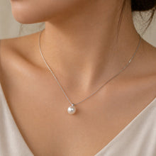 Load image into Gallery viewer, Sterling silver necklace with a fresh water shell pearl pendant, minimalist design by Luxe Treasures.