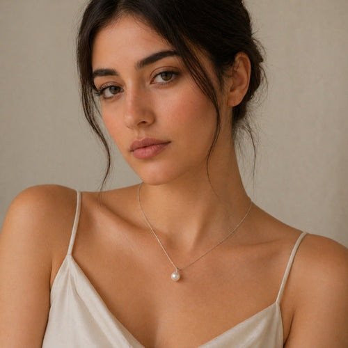 Minimalist freshwater shell pearl necklace in 925 sterling silver by Luxe Treasures, featuring a simple, elegant design.