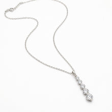 Load image into Gallery viewer, Dainty sterling silver CZ charm necklace with a French pendant, showcasing elegant jewelry design by Luxe Treasures.