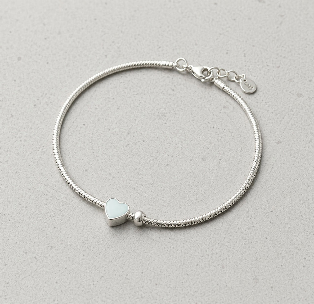 Sterling silver round bead heart bracelet by Luxe Treasures featuring dainty vintage style design.
