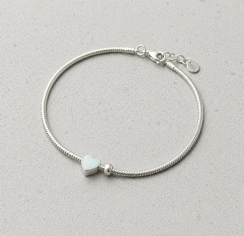 Sterling silver round bead heart bracelet by Luxe Treasures featuring dainty vintage style design.