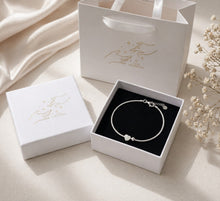 Load image into Gallery viewer, Dainty vintage-style sterling silver heart and round bead bracelet with intricate detailing, elegant jewelry accessory from Luxe Treasures