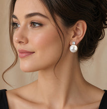 Load image into Gallery viewer, Elegant pearl drop earrings by Luxe Treasures featuring retro-style dangle design with lustrous pearls and vintage-inspired details.