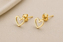 Load image into Gallery viewer, Stainless steel heart stud earrings by Luxe Treasures, minimalist jewelry with small, shiny heart-shaped studs for everyday wear.