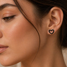 Load image into Gallery viewer, Stainless steel heart stud earrings featuring a minimalist design, perfect for everyday jewelry wear from Luxe Treasures.