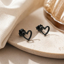 Load image into Gallery viewer, Stainless steel heart stud earrings with minimalist design, featuring small, shiny hearts on posts for elegant everyday wear.