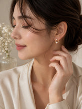 Load image into Gallery viewer, Gold circle dangle earrings with CZ stones and pearls in French style, designed by Luxe Treasures.