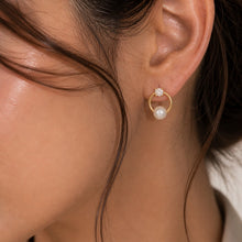 Load image into Gallery viewer, Gold circle dangle earrings with CZ stones and pearls in French style, showcasing elegant jewelry design by Luxe Treasures.